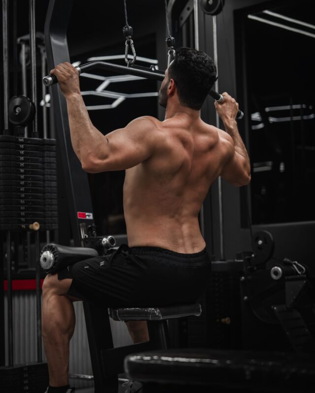 How to build a v-taper: back and shoulder training plan | the gym pro Man Using A Lat Pulldown Machine