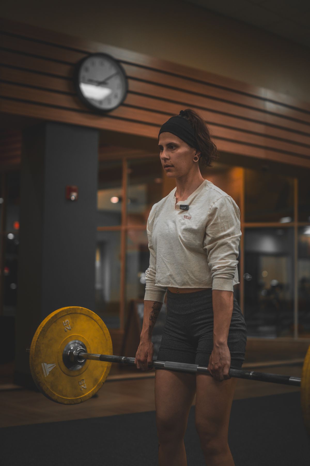 How to deadlift: setup, technique and beginner progression | the gym pro Lifter Holding A Barbell At The Top Of A Deadlift